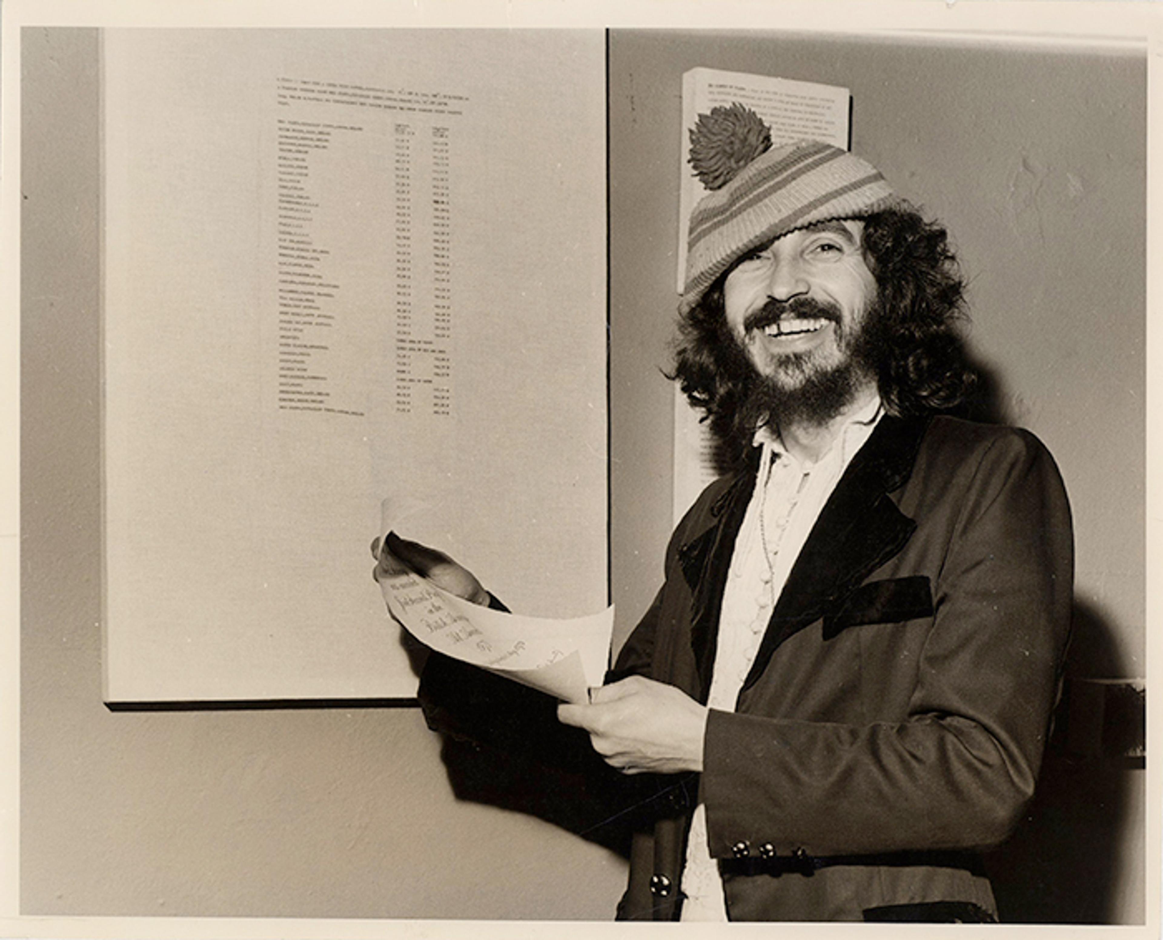 İsmail Saray, in front of his work Eros that received a British Airways Art Award, 1973