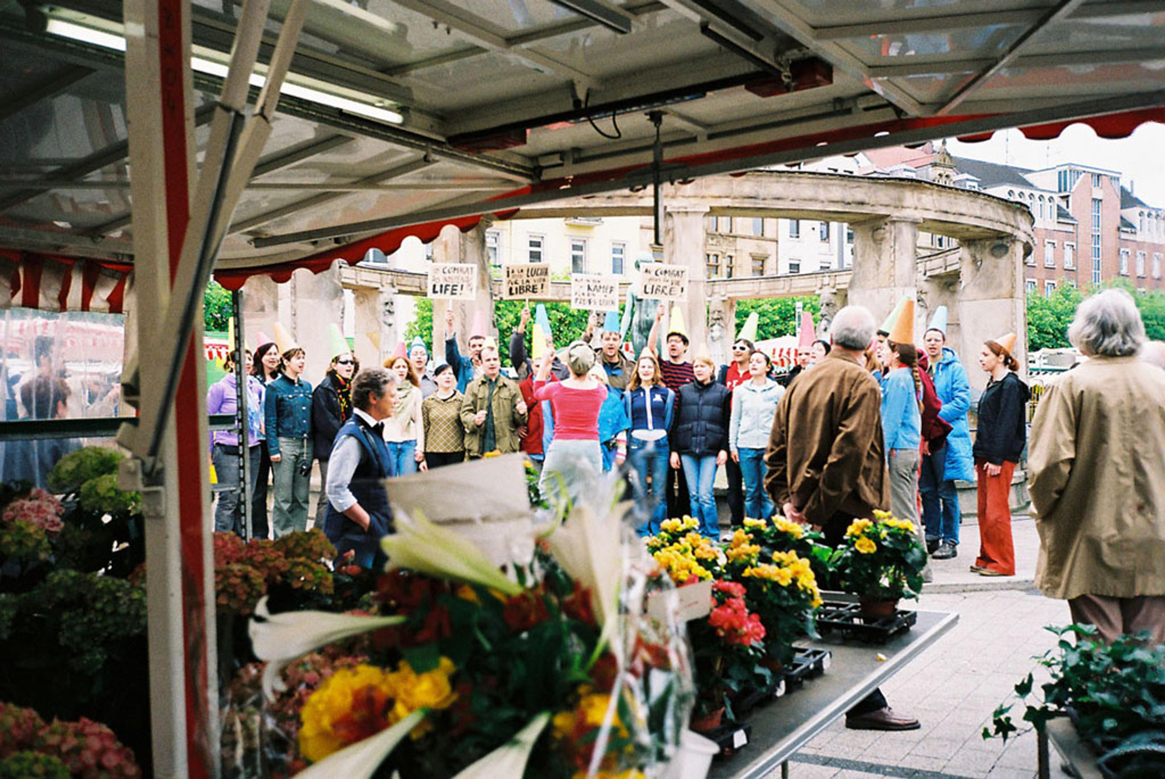 Horkeškart choir performing at the farmers market in Karlsruhe, Germany, 2005